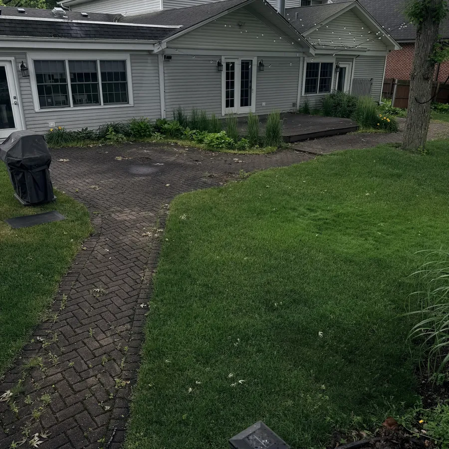Pressure washing before, house exterior