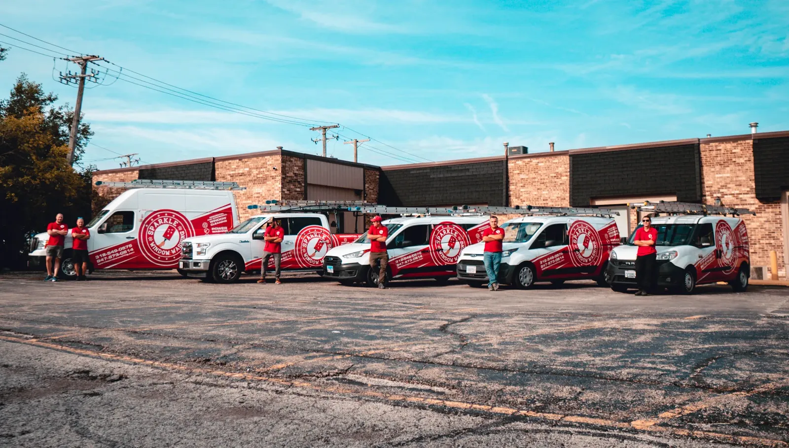 The Sparkle Service team with our fleet of vans