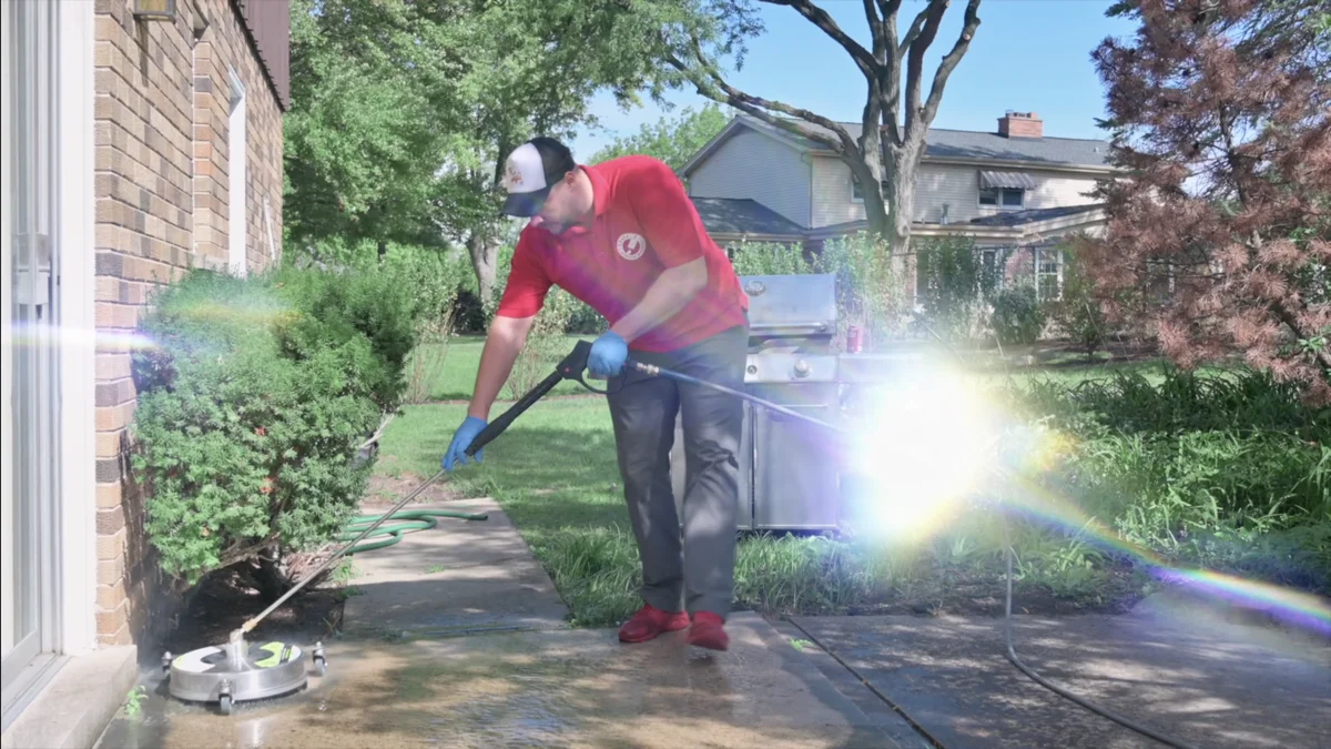 Sparkle Service pressure washing a patio in Winnetka