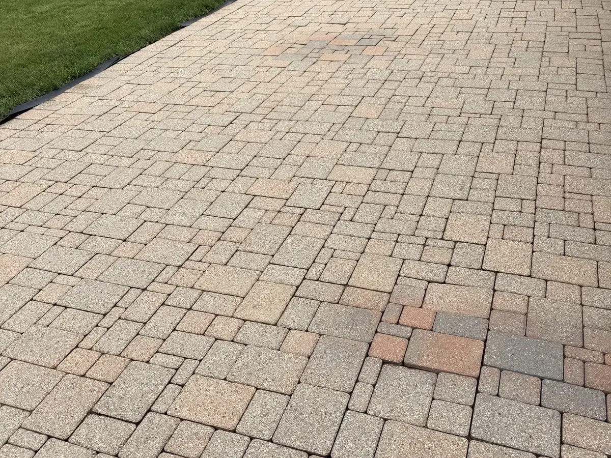 The same paver patio after washing, the pavers back to their original colour